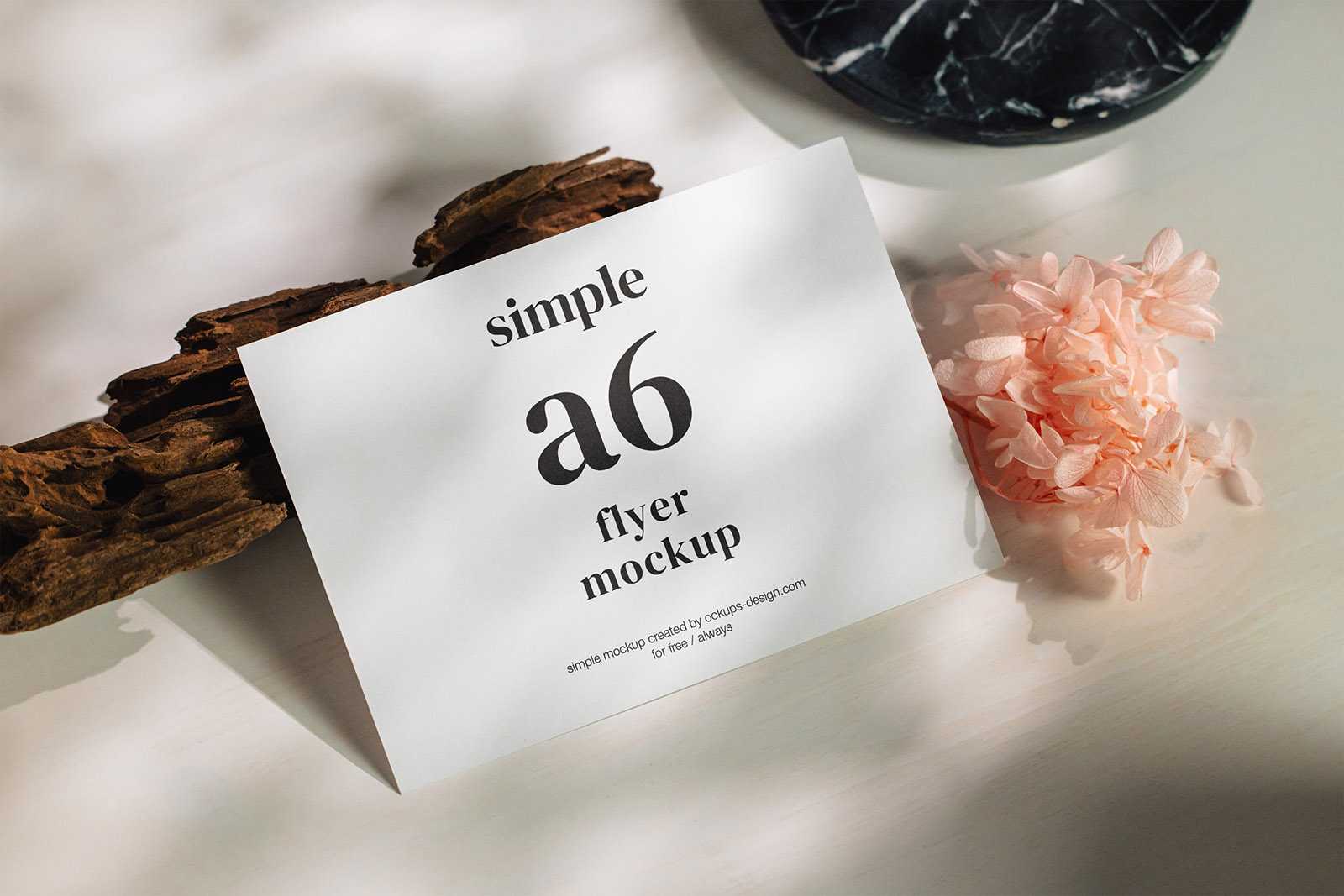 A6 flyer on white planks mockup