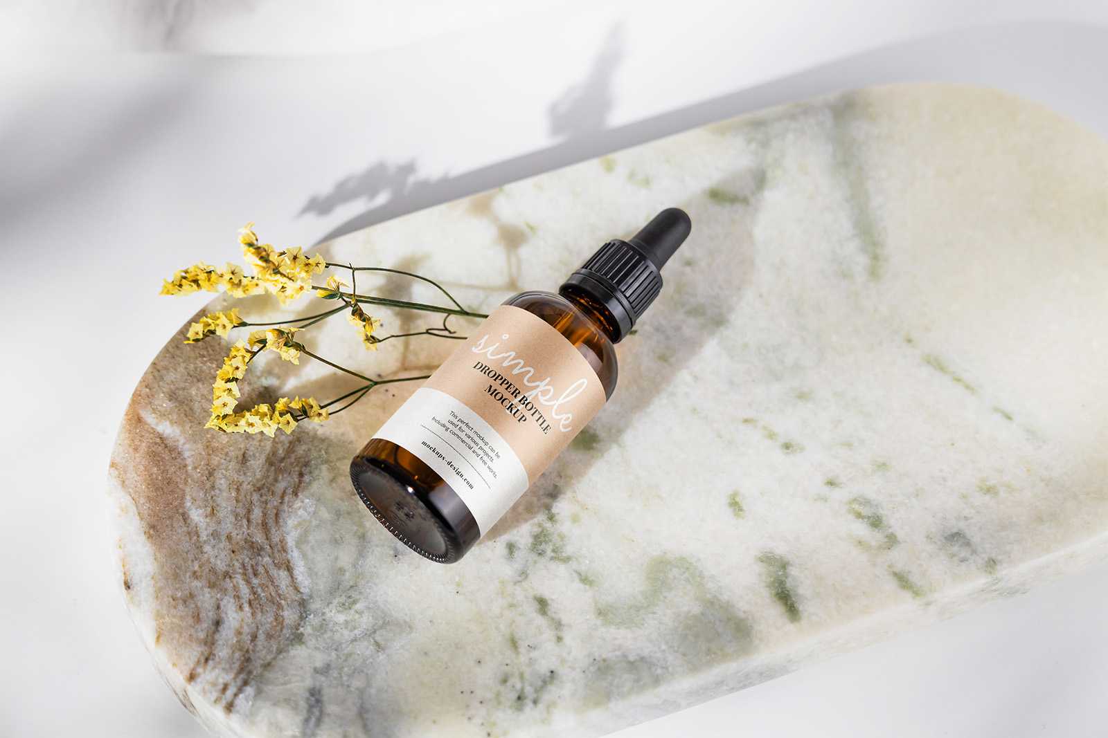 Amber bottle on marble tile mockup