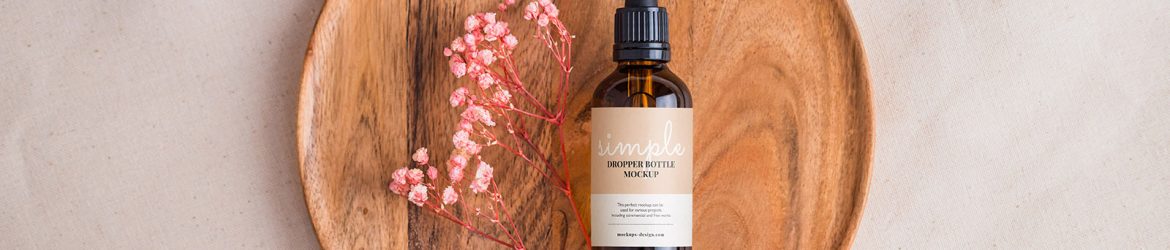 Amber bottle with dried flowers mockup