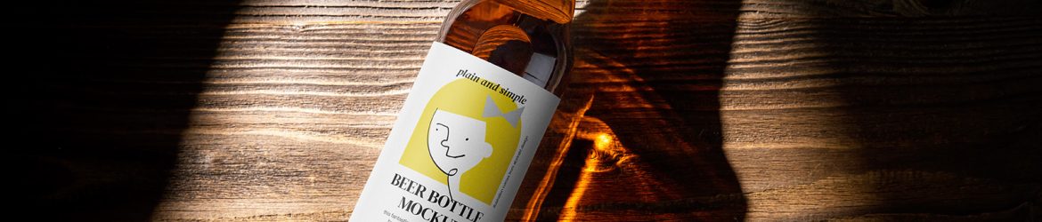 Beer bottle on wooden background mockup