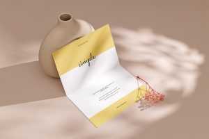 Bi fold flyer with a flowerpot mockup