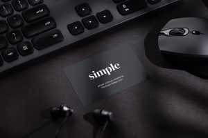 Black business card on black background mockup