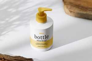 Bottle with pump on white background mockup
