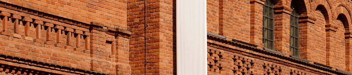 Brick wall mounted flag mockup