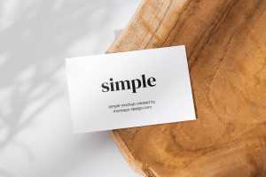 Business card on a slice of wood mockup