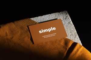 Business card on concrete tile mockup