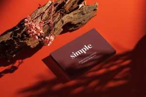 Business card on red background mockup