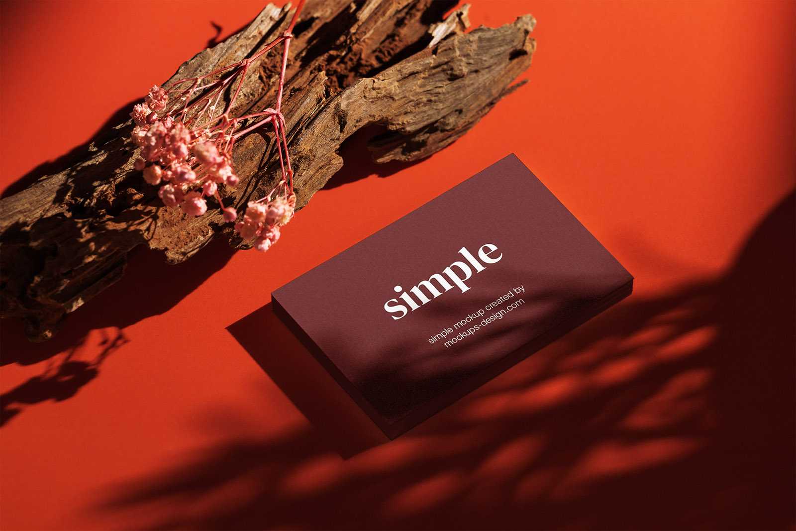 Business card on red background mockup