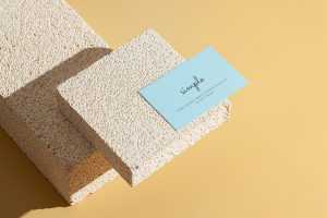 Business card on stone tiles mockup