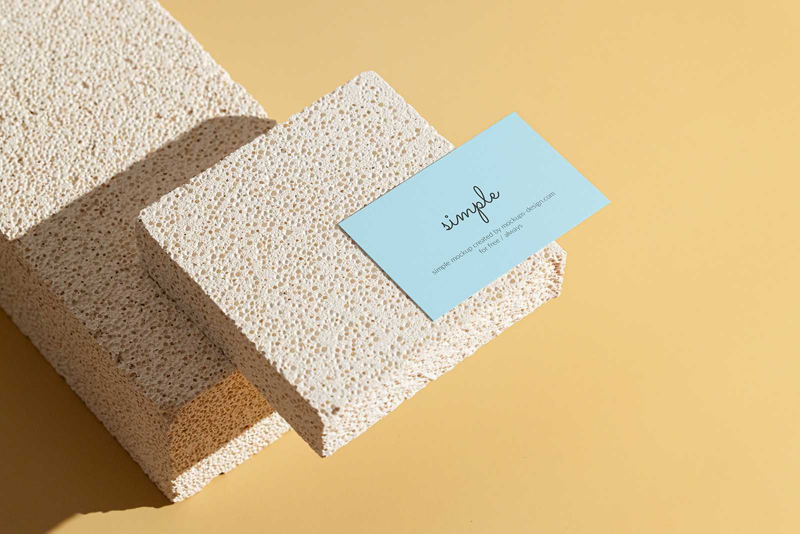 Business card on stone tiles mockup