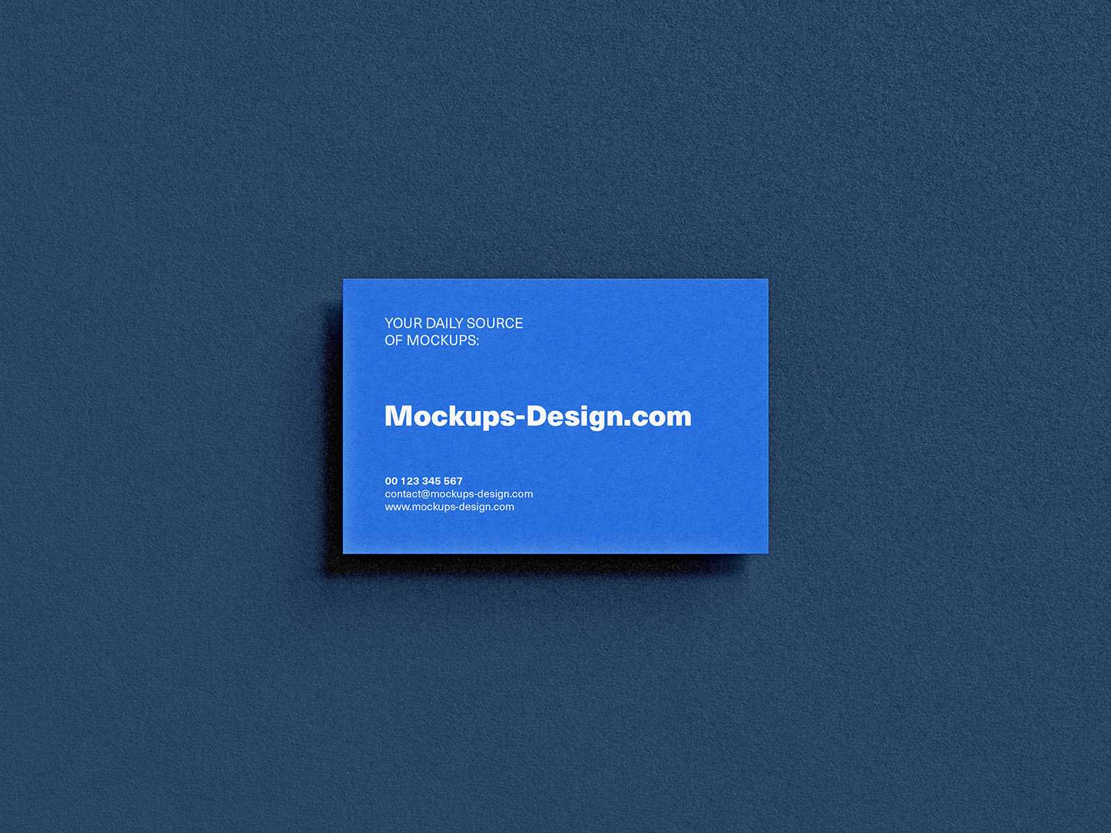 Business card on textured paper mockup