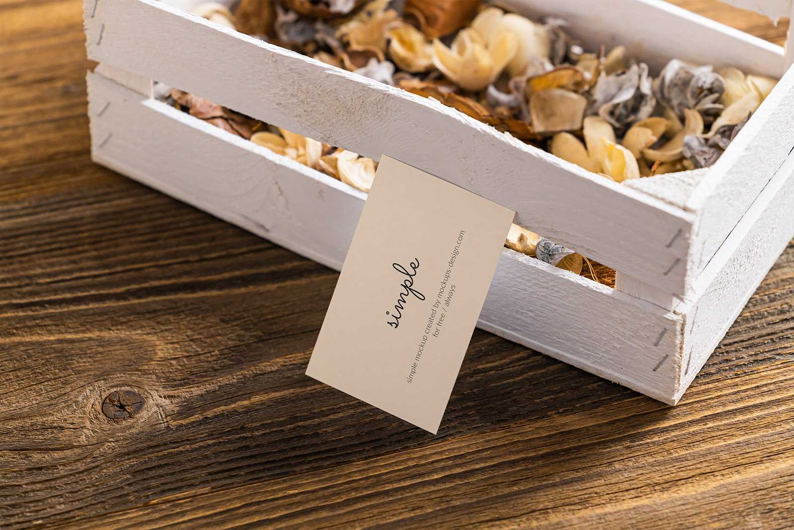 Business card on wooden crate mockup