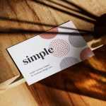Business card on wooden table mockup