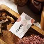 Business card on wooden tray PSD