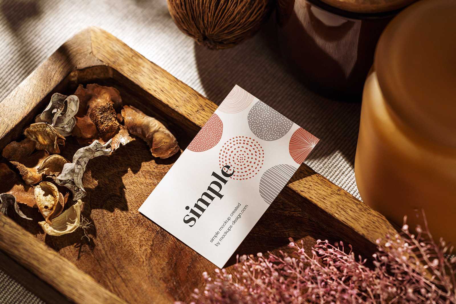 Business card on wooden tray PSD