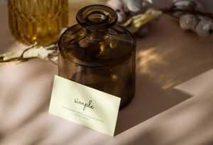 Business card with glass vase mockup