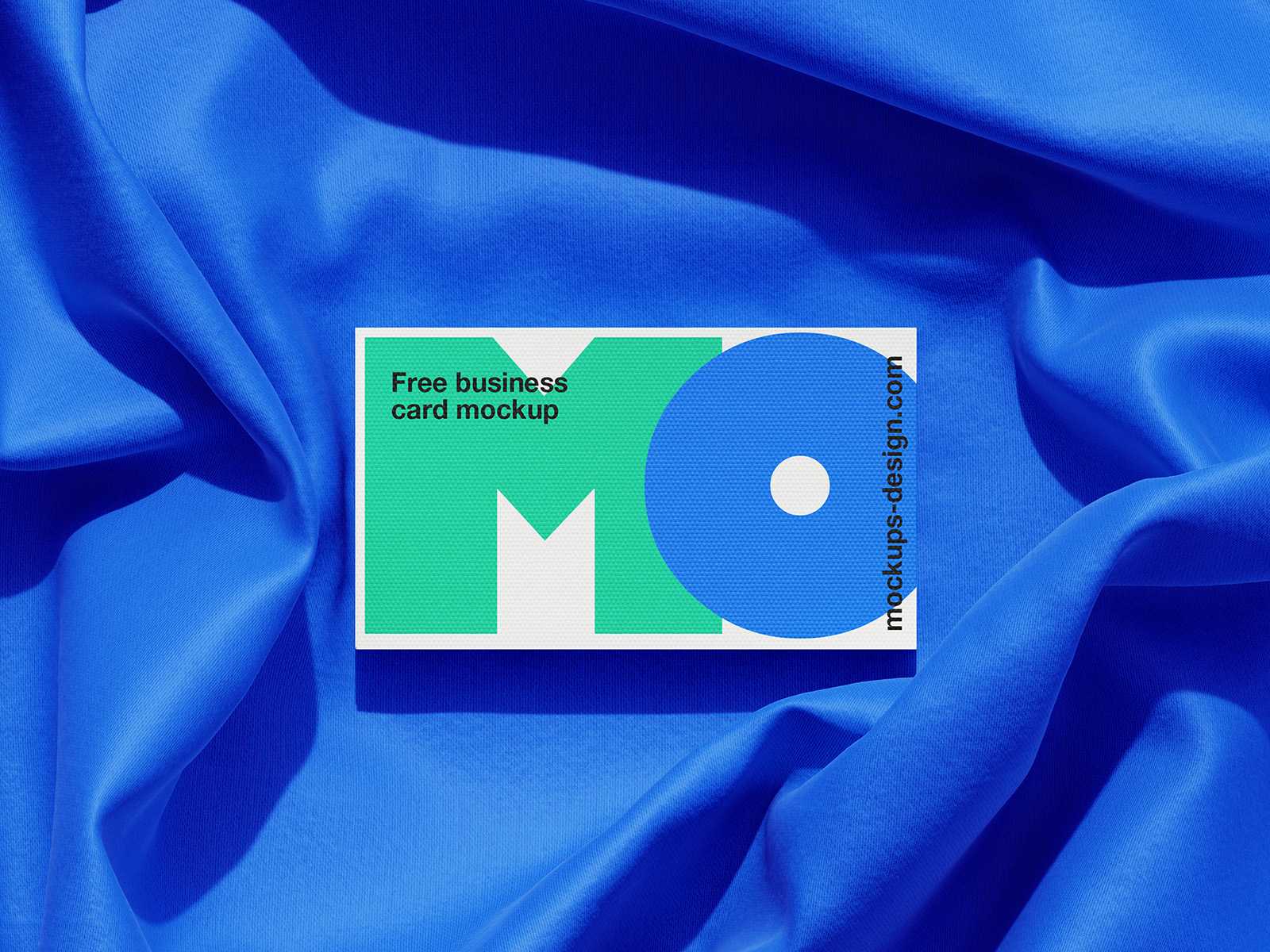 Business cards lying on a fabric mockup