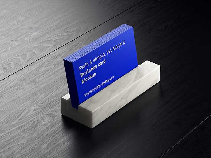 Business cards on dark wood mockup