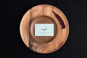 Business cards on wood tray mockup
