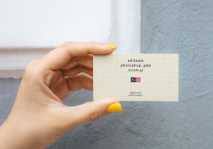 Card in Hand Mockup (PSD)