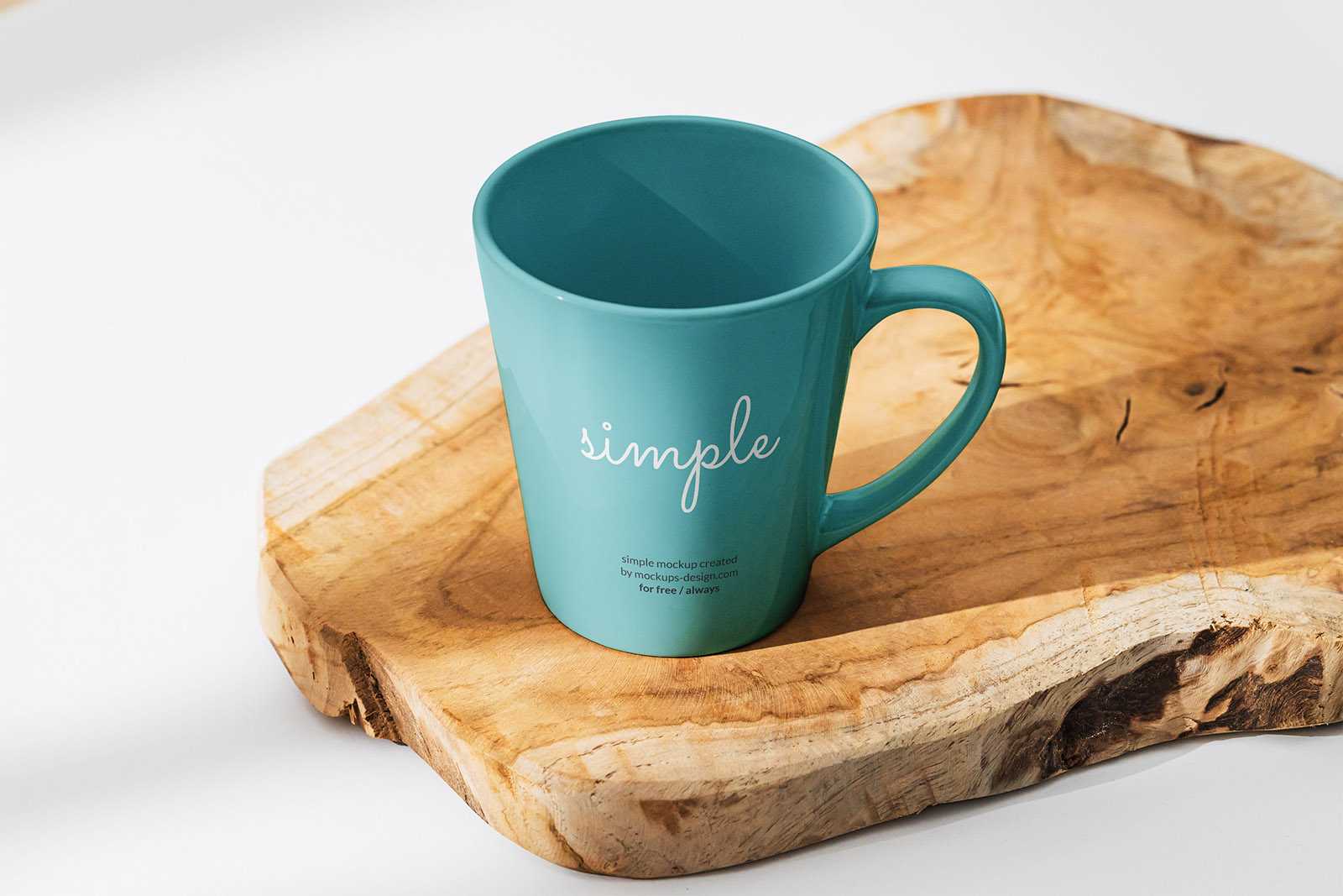 Ceramic mug on a slice of wood mockup
