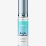 Clear spray bottle mockup with metallic cap
