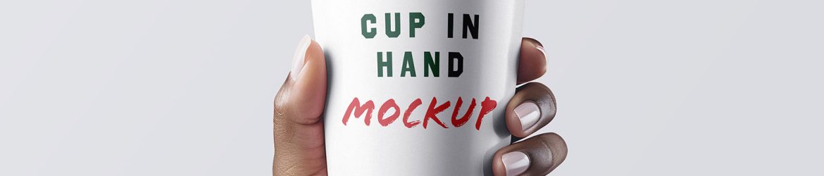 Coffee Cup In Hand Mockup