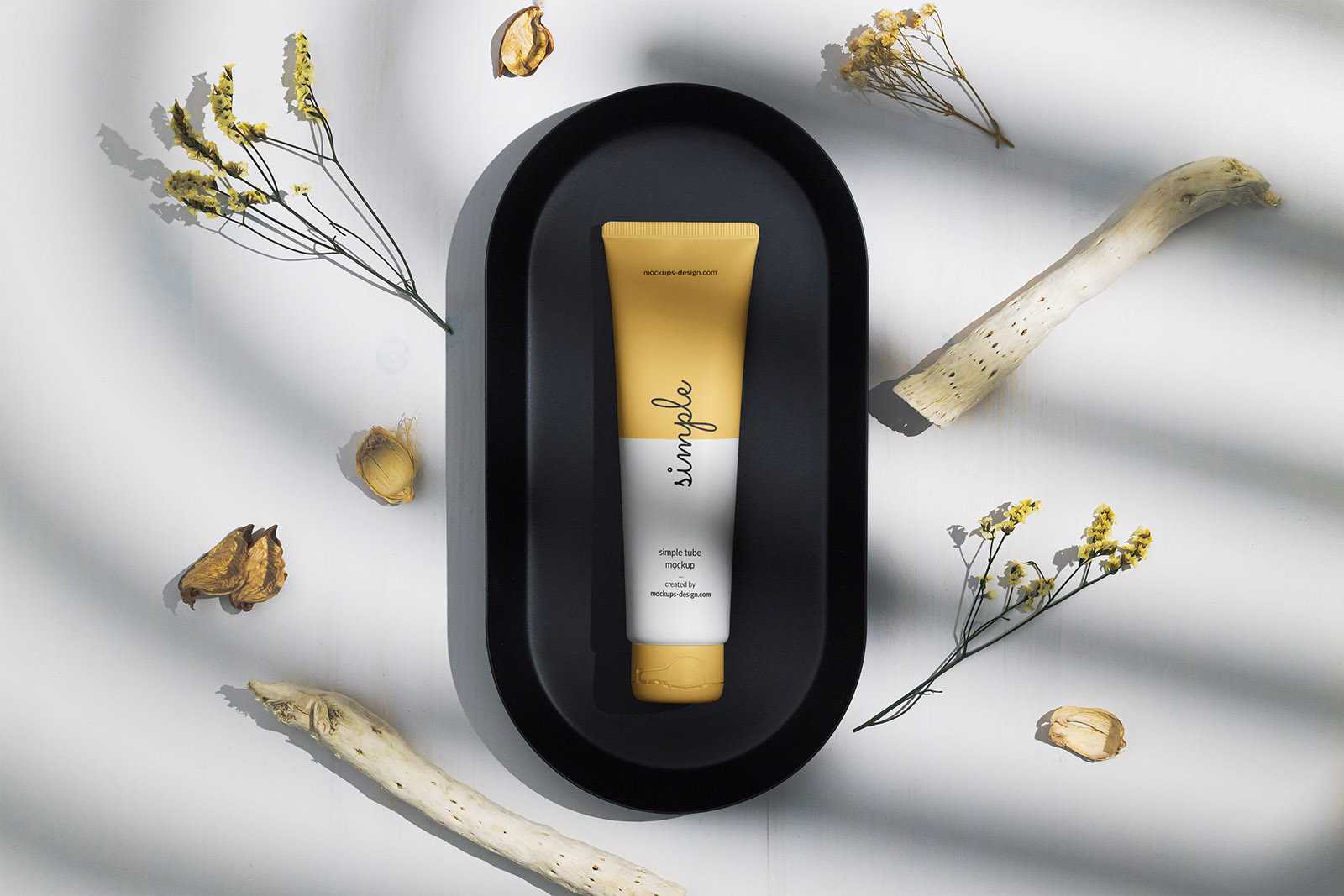 Cosmetic tube on a black tray mockup