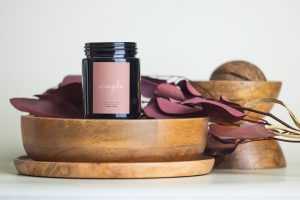 Dark candle with decorative elements mockup