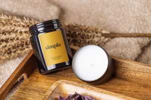 Dark glass candle in tray mockup