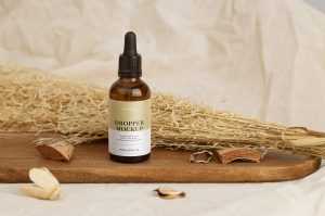 Dropper bottle with essential oil mockup