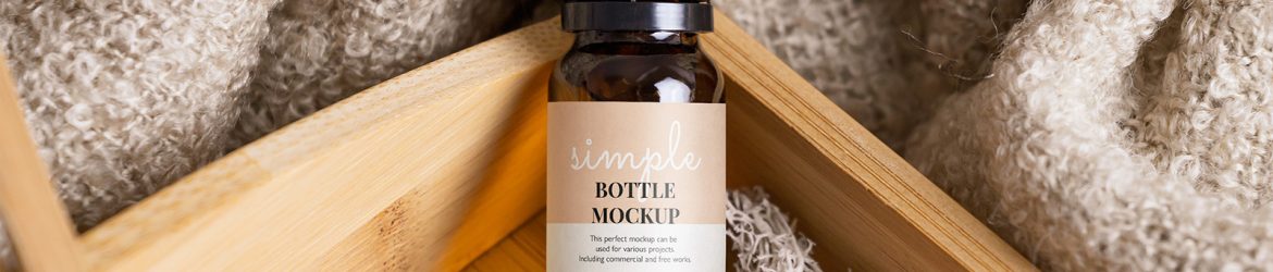 Essentail oil bottle in the tray mockup
