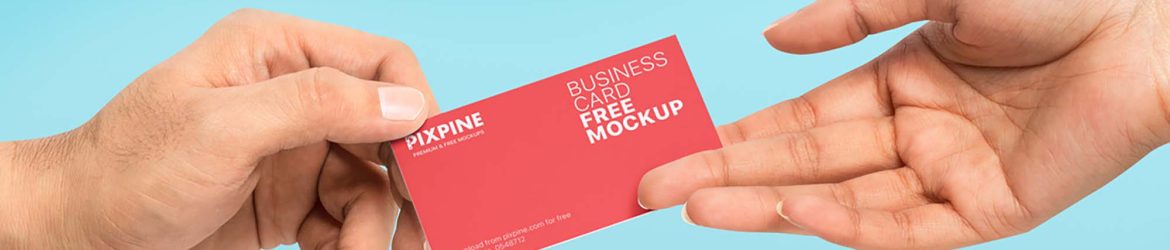 Free Business Card Given in Hand Mockup (PSD)