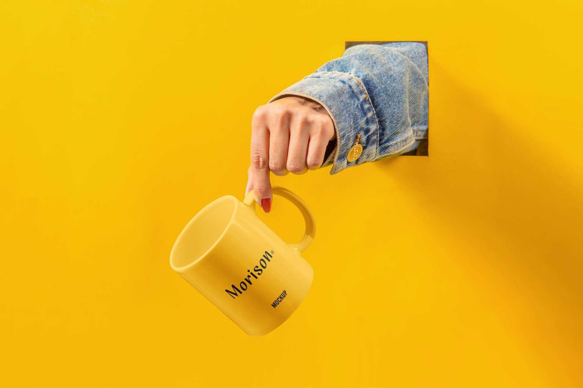 Free Cup with Hand Mockup (PSD)