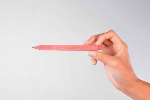 Free Hand Holding Branding Pen Mockup (PSD)