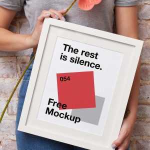 Free Hand Holding Frame Mockup (PSD)