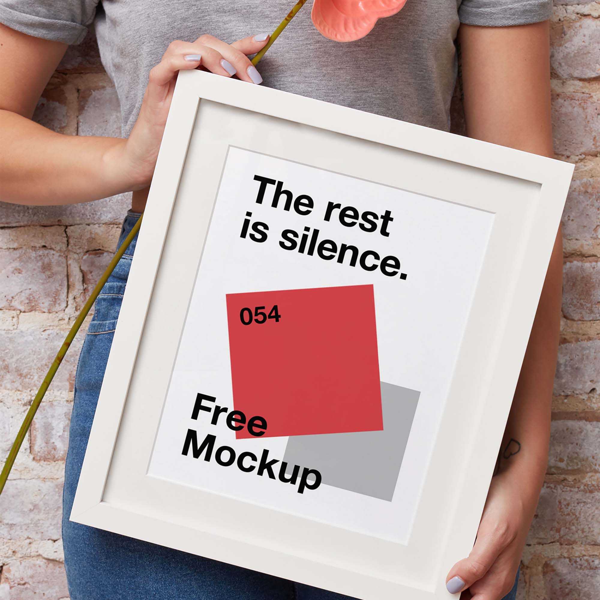 Free Hand Holding Frame Mockup (PSD)
