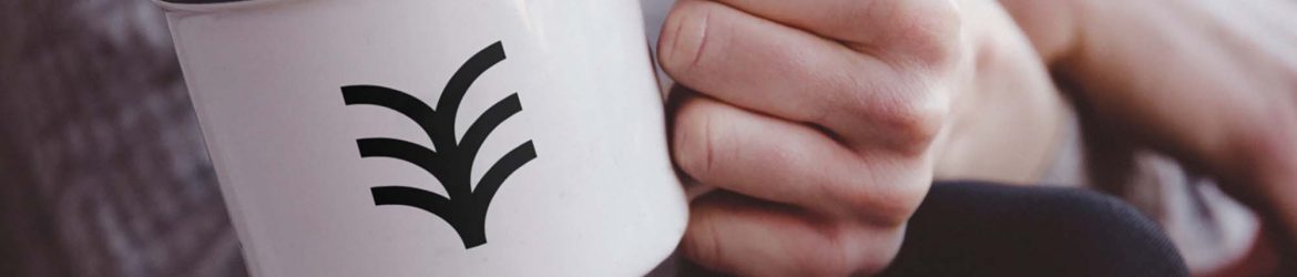 Free Hand Holding Metal Mug Mockup (PSD)