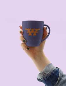 Free Hand Holding Mug Mockup (PSD)