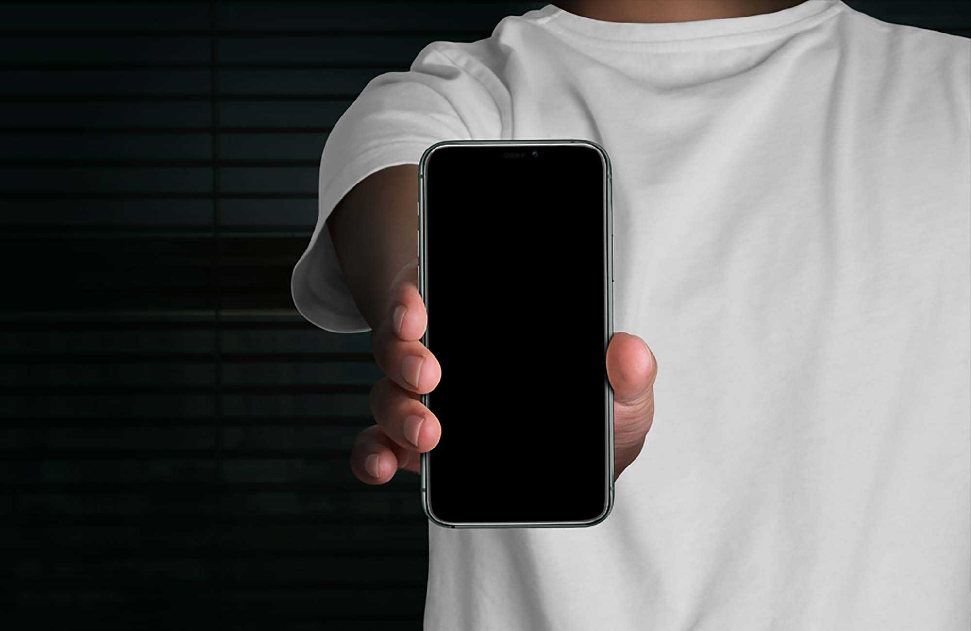 Free Handheld iPhone 11 Pro Mockup (PSD)