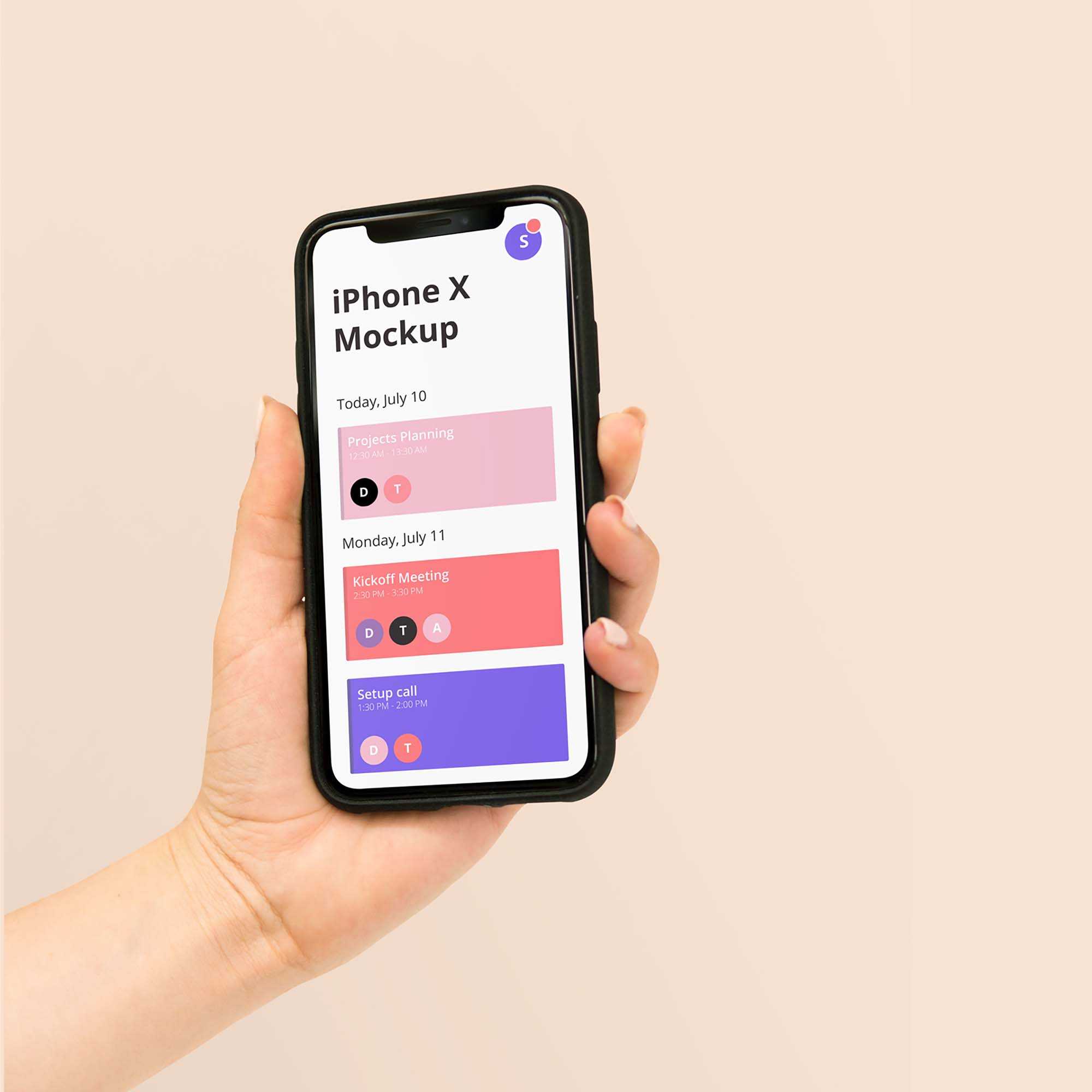 Free in Hand iPhone X Mockup (PSD)