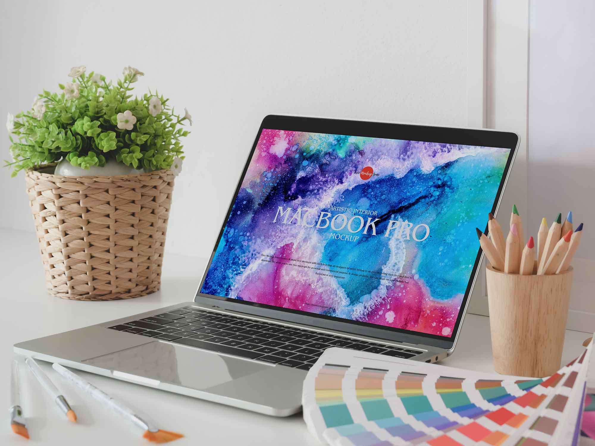 Free Interior MacBook Pro Mockup (PSD)