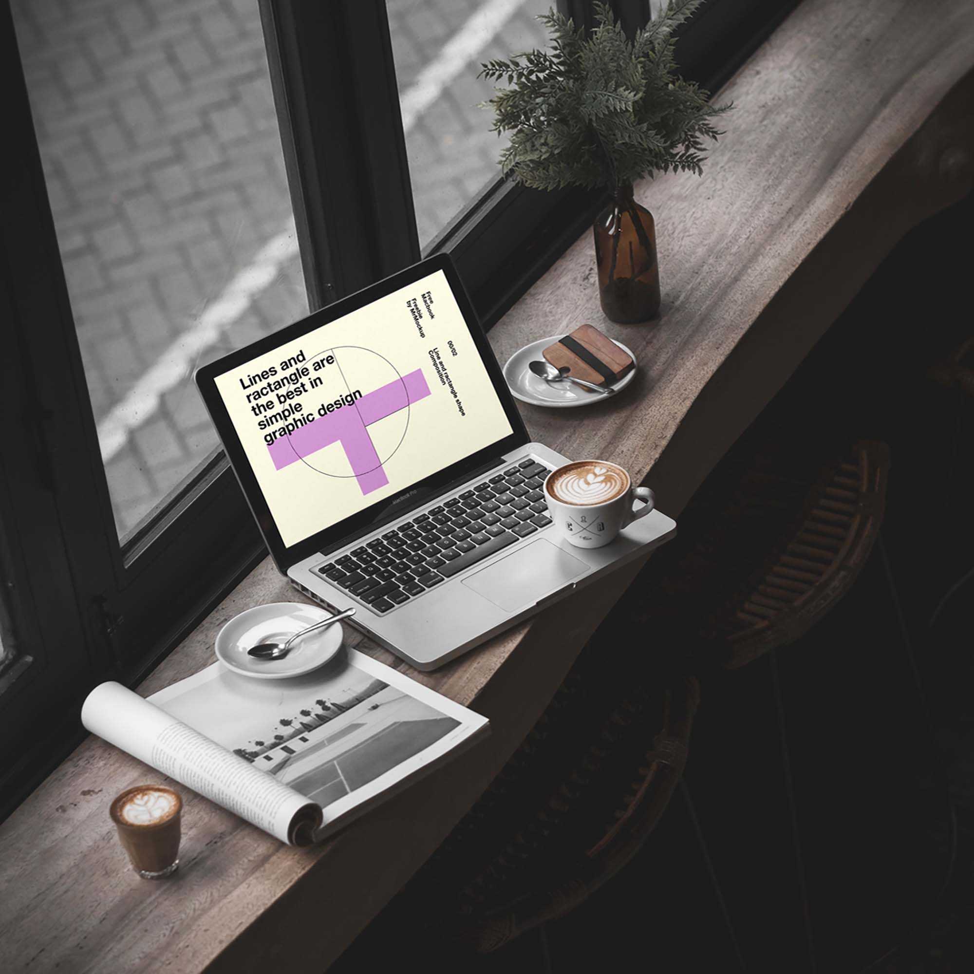 Free MacBook Pro in Cafe Mockup (PSD)