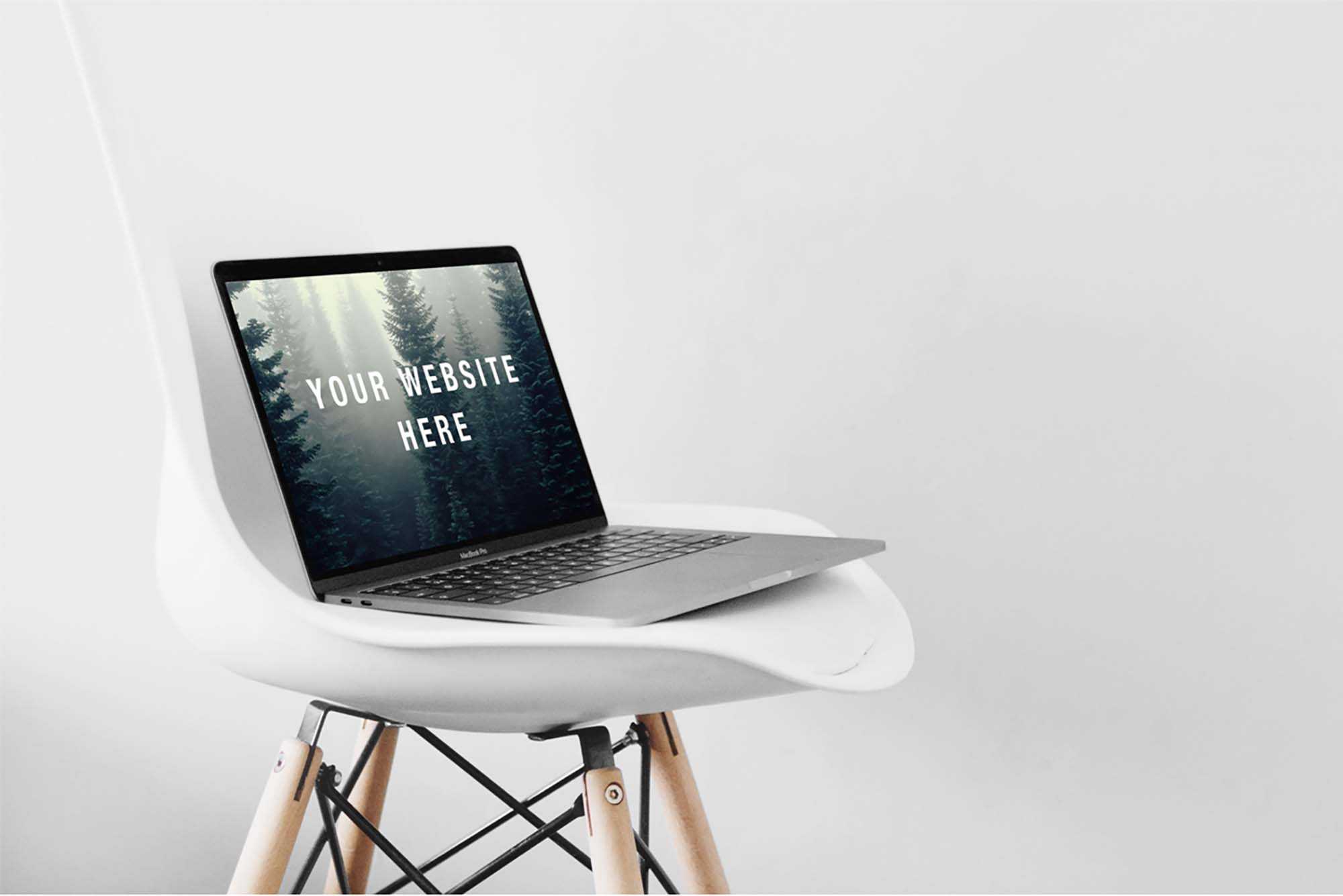 Free MacBook Pro Mockup on Chair (PSD)