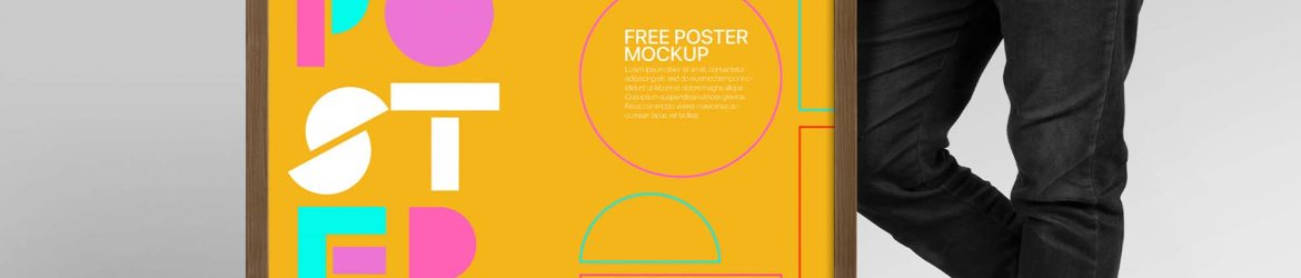 Free Man Holding Poster Mockup (PSD)
