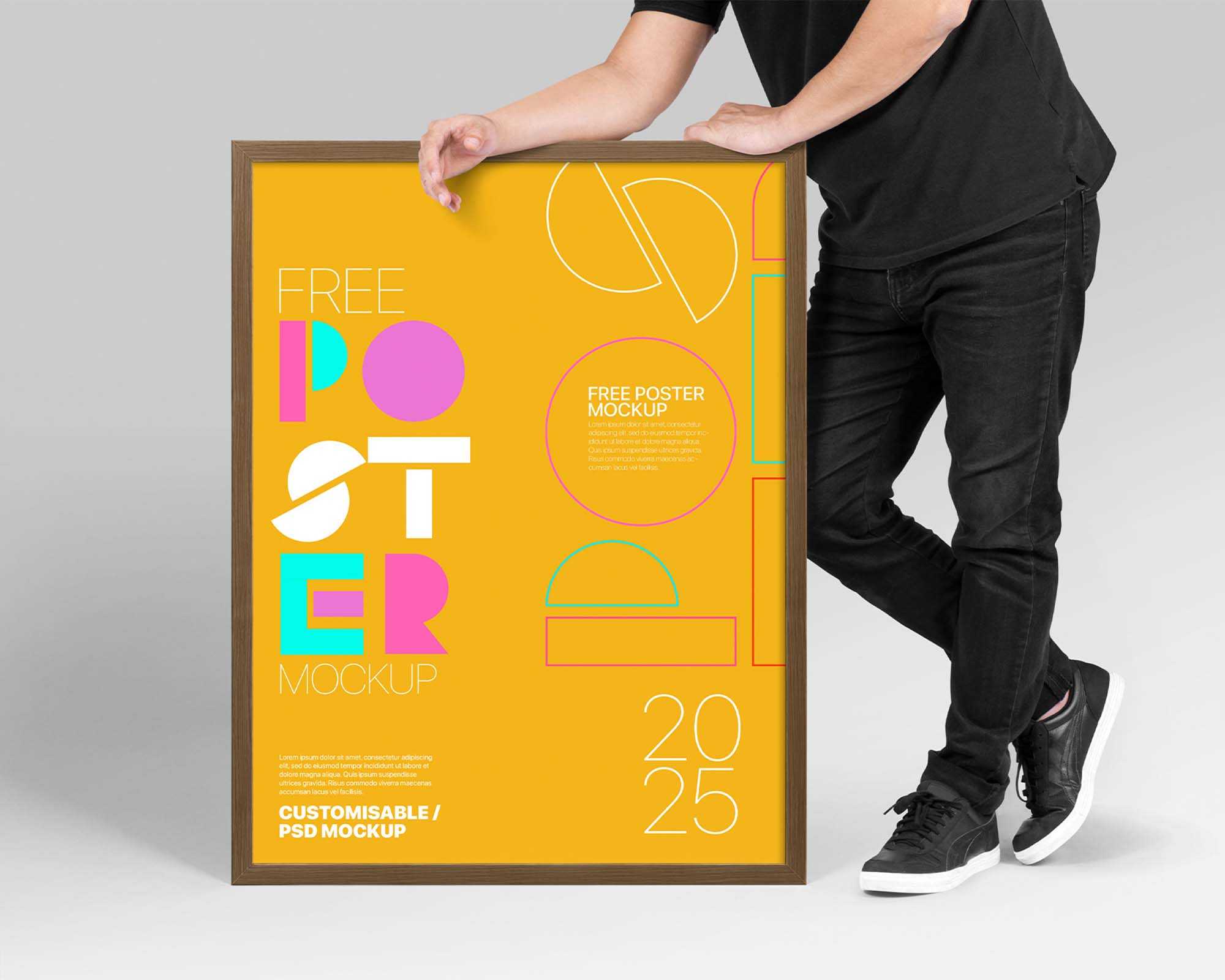 Free Man Holding Poster Mockup (PSD)