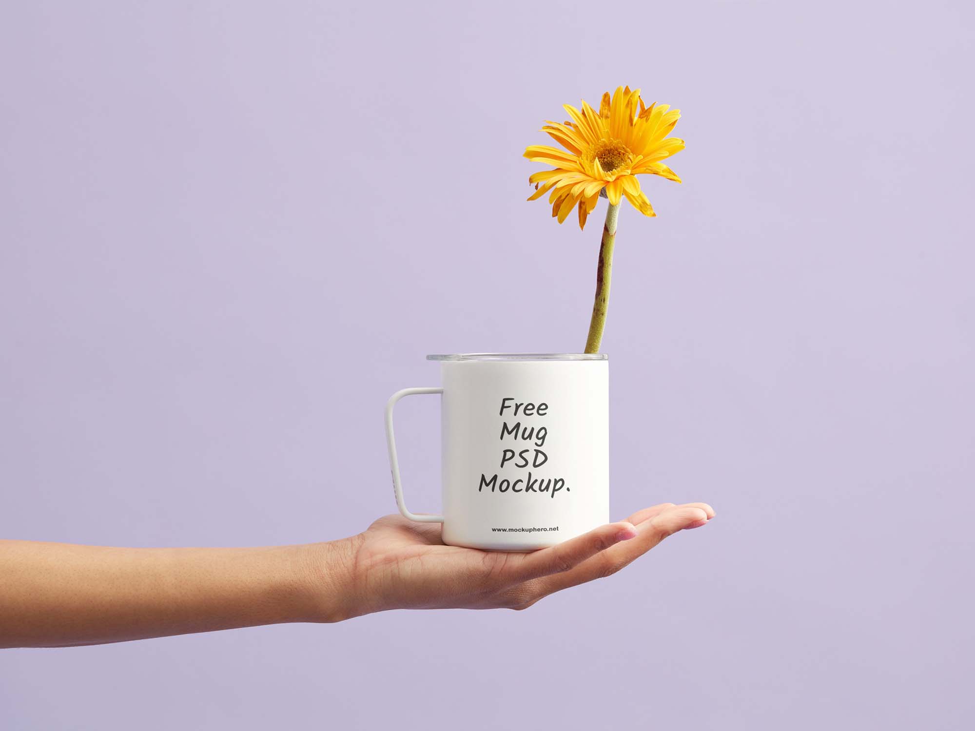 Free Mug in Hand Mockup (PSD)