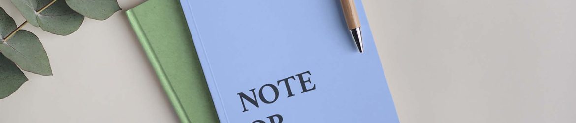 Free Notebook with Pen Mockup (PSD)
