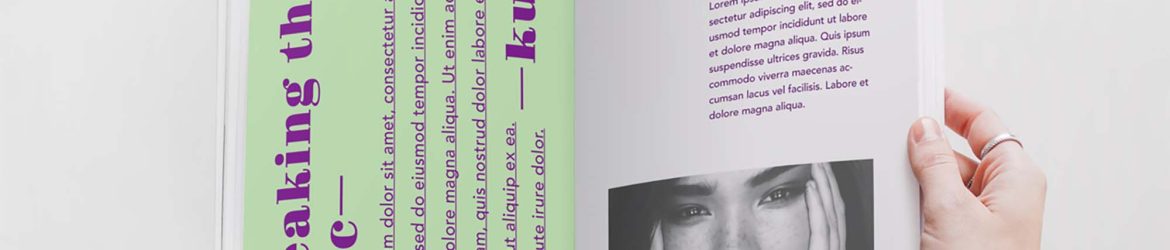 Free Opened by Hand Magazine Mockup (PSD)