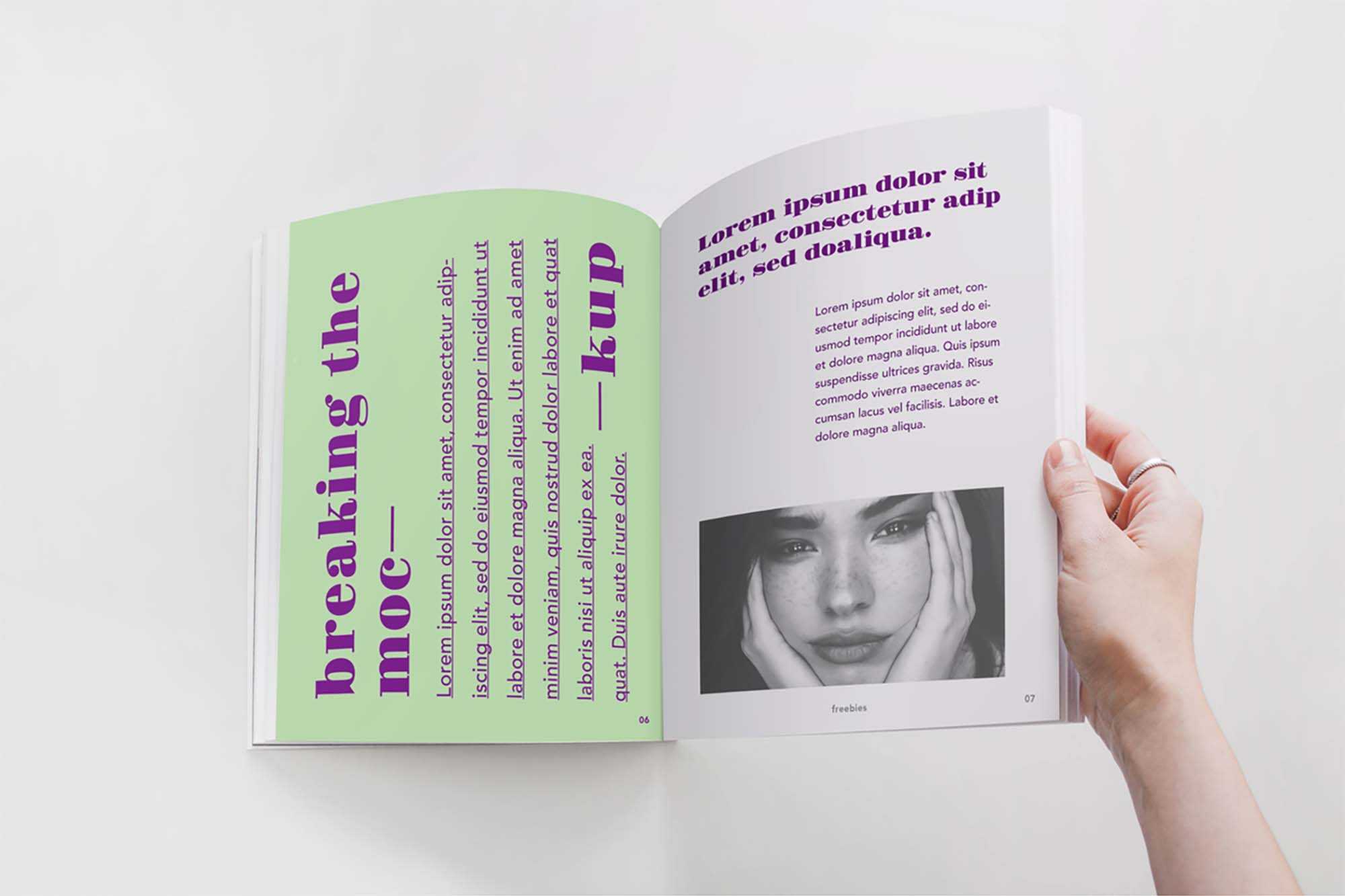 Free Opened by Hand Magazine Mockup (PSD)